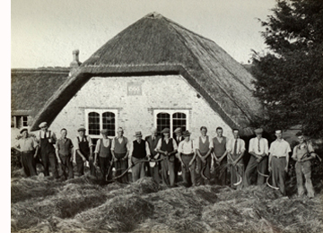This picture was copied from an original which hangs in the church. It was taken at the annual grass cutting in June 1951. The Rev Banton is pictured in the centre of the photograph. Click on picture for larger image.